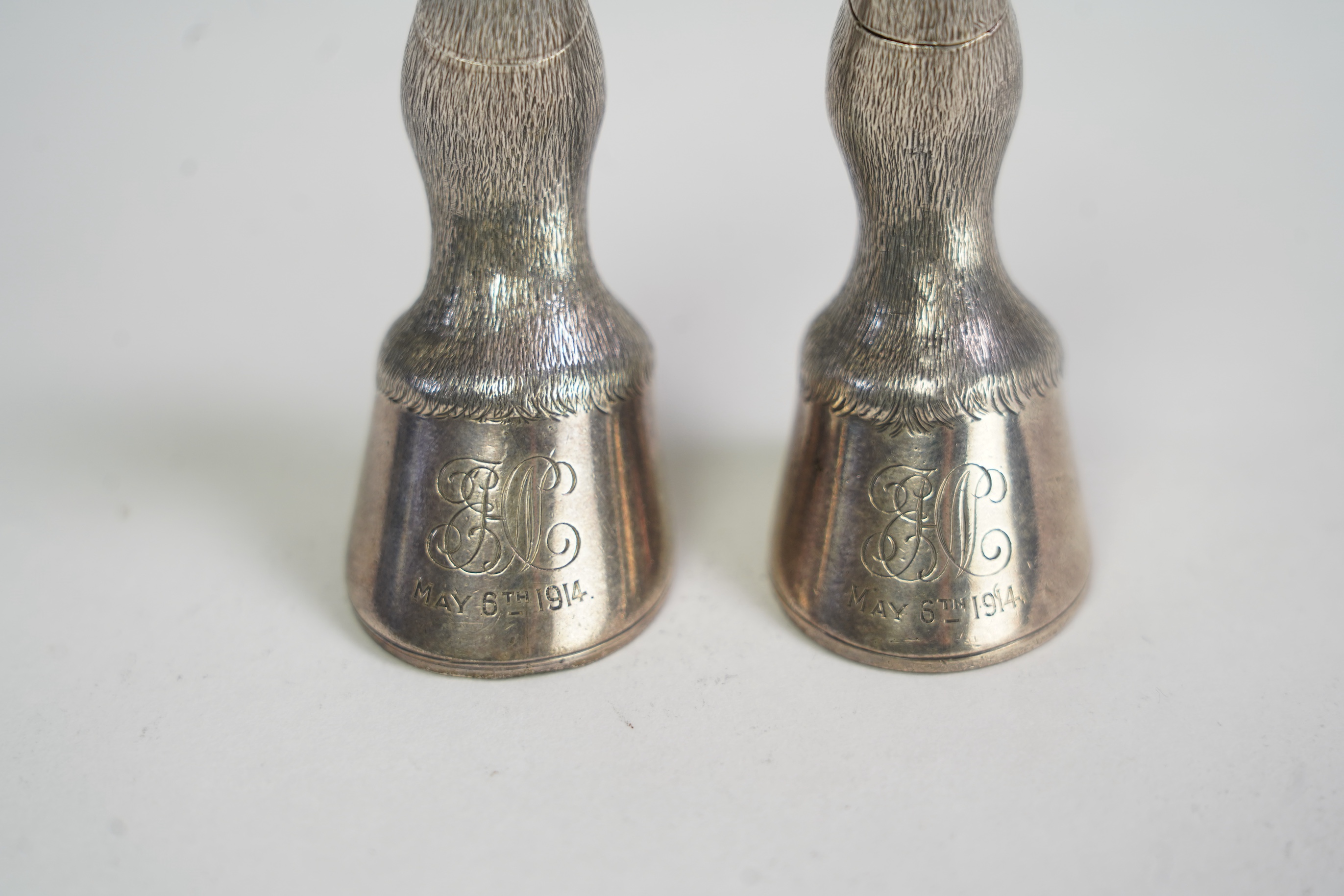 A pair of Edwardian novelty silver condiments modelled and a horse's fetlock and hoof, makers mark rubbed